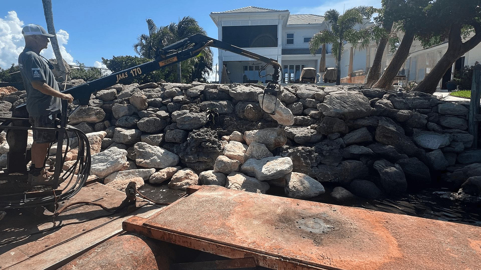 land vs barge seawall installation
